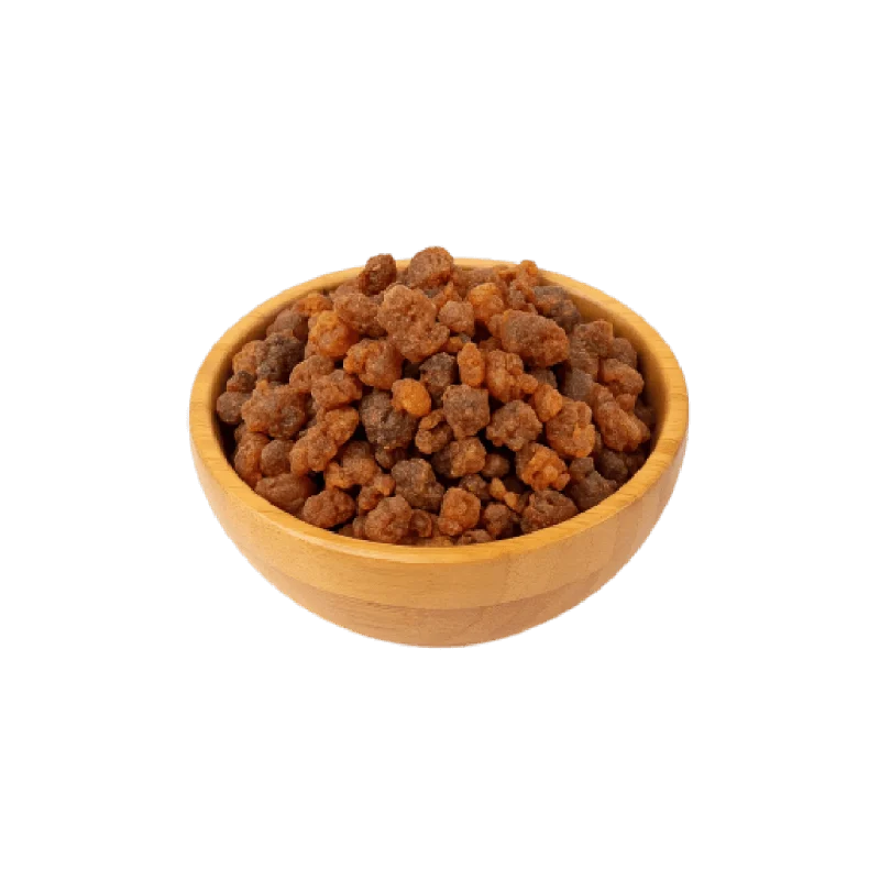 عکس مقداری صمغ مرمکی در کاسه چوبی