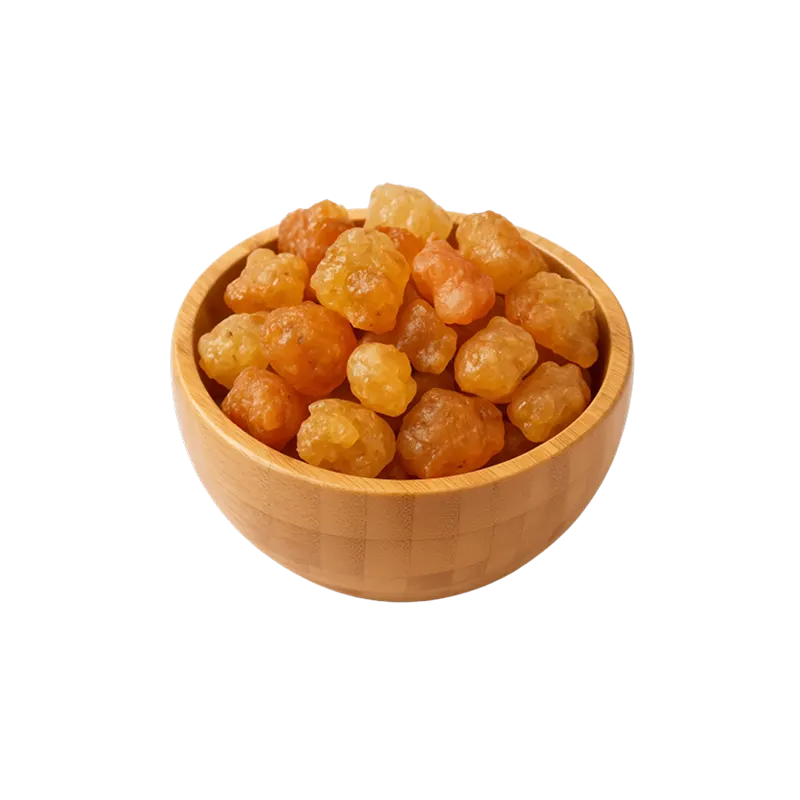 عکس گلوله های صمغ آنغوزه در کاسه چوبی